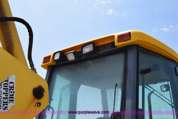 image for item K8521 2003 New Holland LB75 backhoe