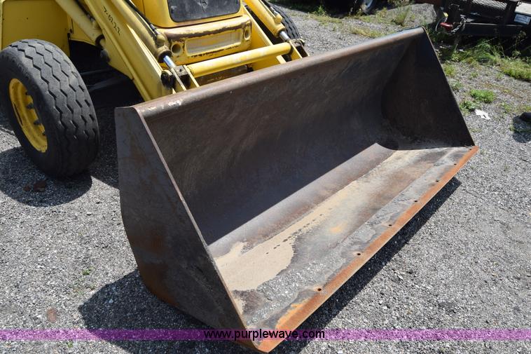 image for item K8521 2003 New Holland LB75 backhoe