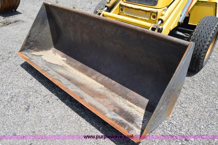 image for item K8521 2003 New Holland LB75 backhoe