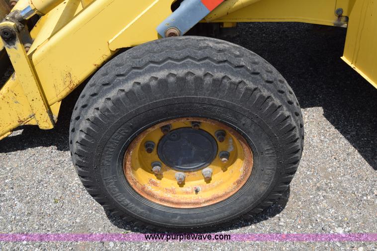 image for item K8521 2003 New Holland LB75 backhoe