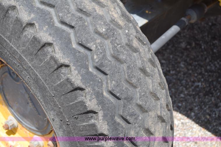 image for item K8521 2003 New Holland LB75 backhoe