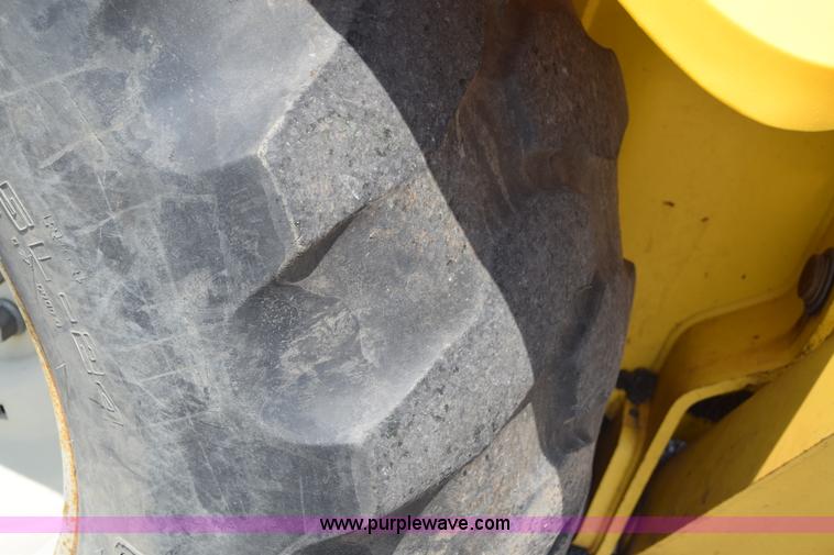 image for item K8521 2003 New Holland LB75 backhoe