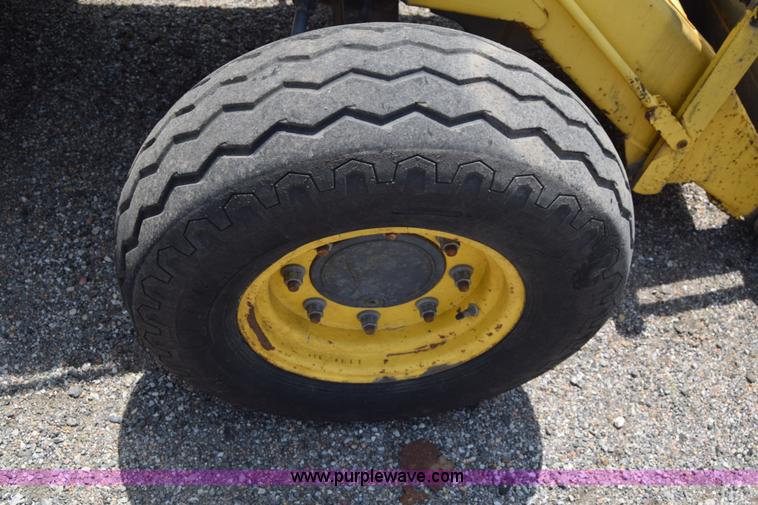 image for item K8521 2003 New Holland LB75 backhoe