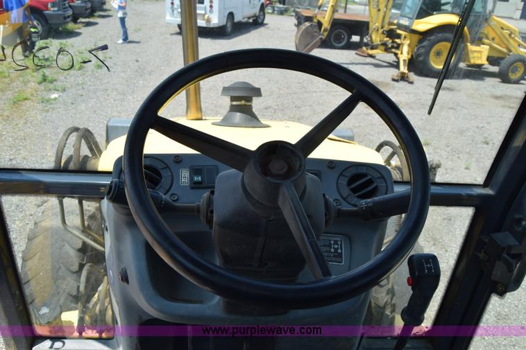 image for item K8522 2003 New Holland LB75 backhoe