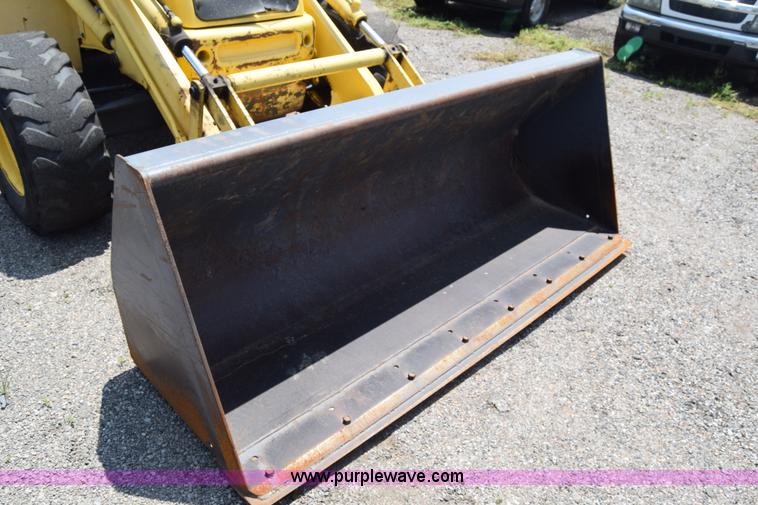 image for item K8522 2003 New Holland LB75 backhoe
