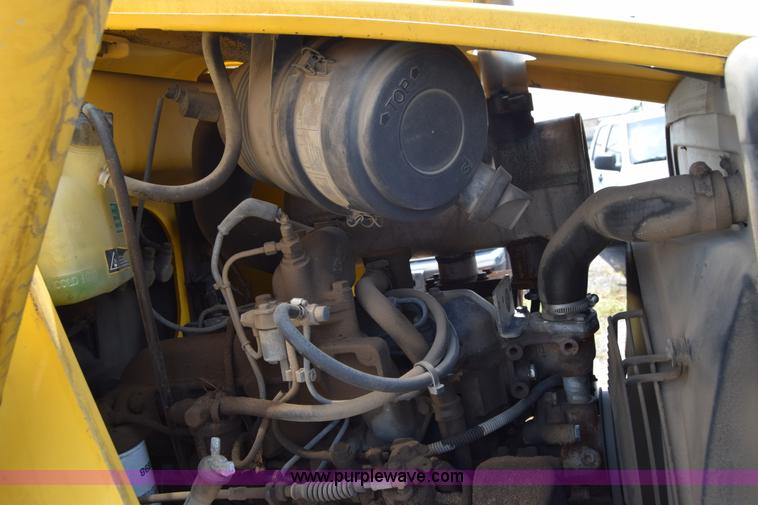 image for item K8522 2003 New Holland LB75 backhoe