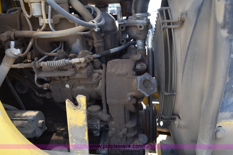 image for item K8522 2003 New Holland LB75 backhoe