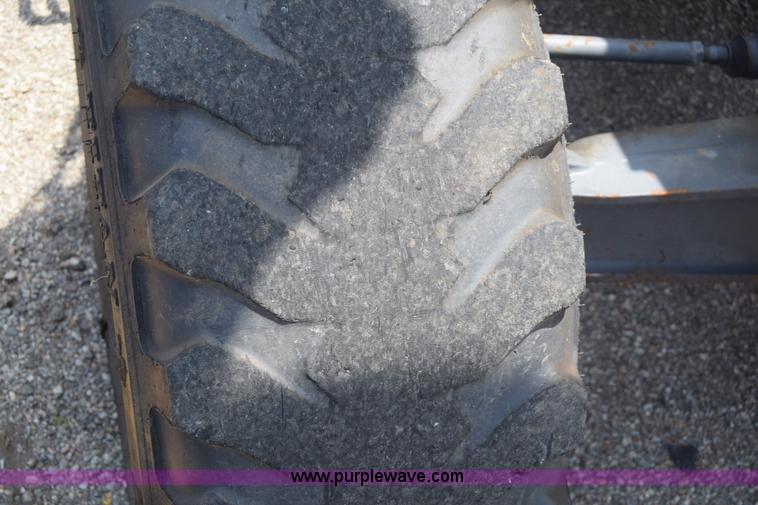 image for item K8522 2003 New Holland LB75 backhoe