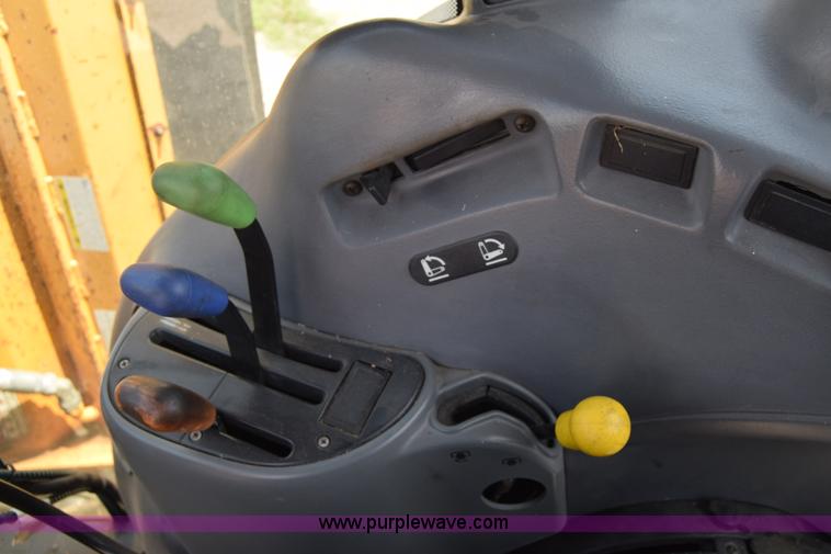 image for item K8569 2004 New Holland TN75DA tractor