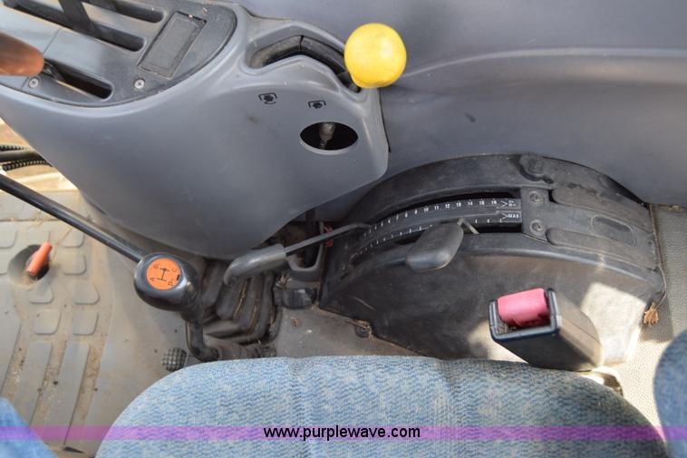 image for item K8569 2004 New Holland TN75DA tractor