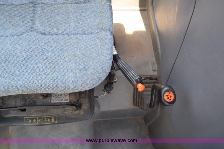 image for item K8569 2004 New Holland TN75DA tractor