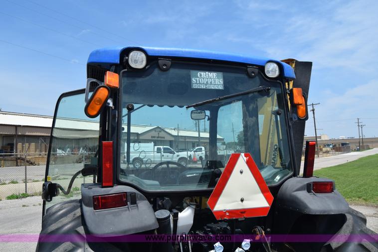 image for item K8569 2004 New Holland TN75DA tractor