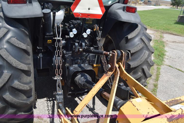 image for item K8569 2004 New Holland TN75DA tractor