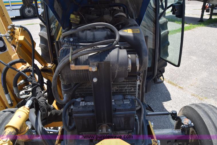 image for item K8569 2004 New Holland TN75DA tractor
