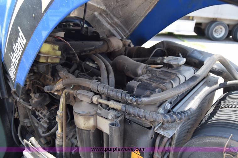 image for item K8569 2004 New Holland TN75DA tractor