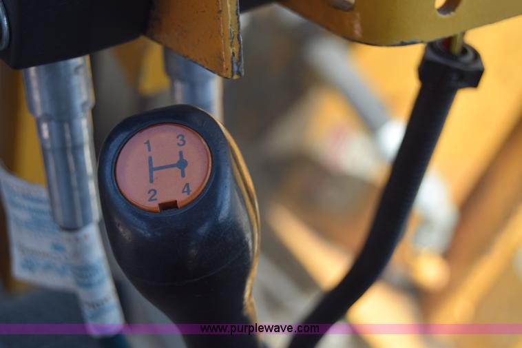 image for item K8569 2004 New Holland TN75DA tractor