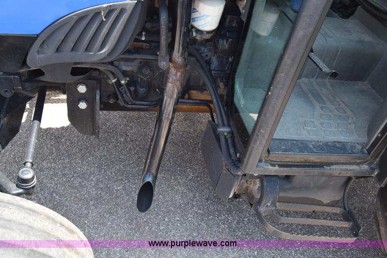 image for item K8569 2004 New Holland TN75DA tractor