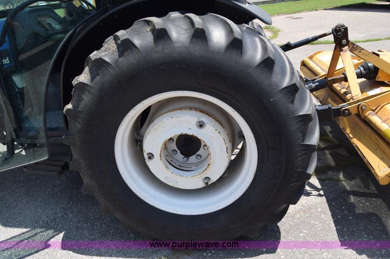 image for item K8569 2004 New Holland TN75DA tractor