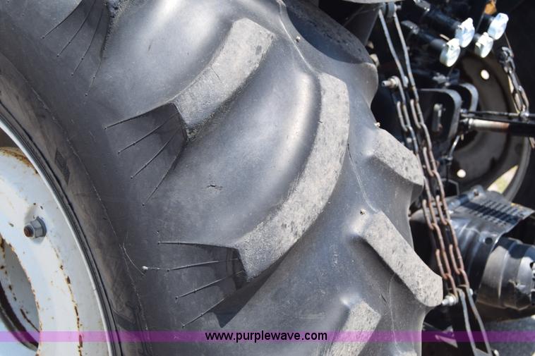 image for item K8569 2004 New Holland TN75DA tractor