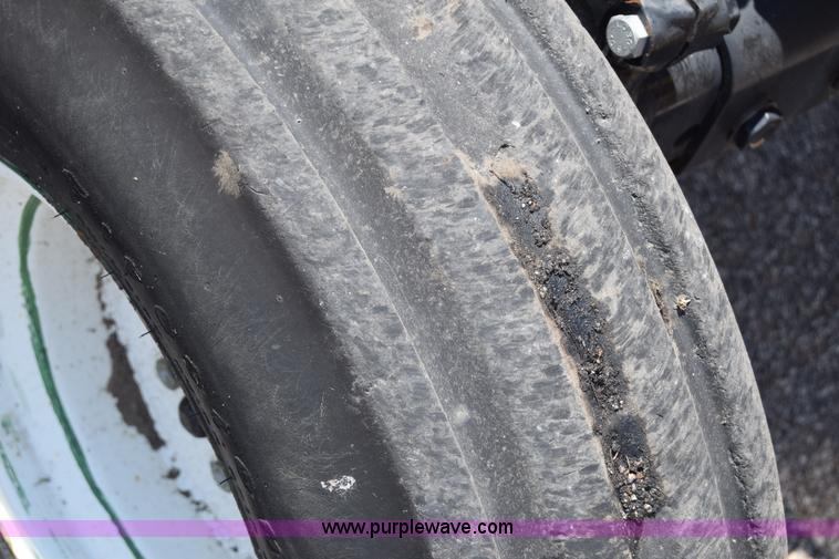 image for item K8569 2004 New Holland TN75DA tractor