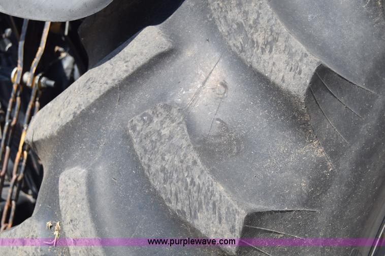 image for item K8569 2004 New Holland TN75DA tractor