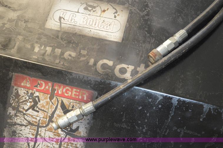 image for item G3594 Bobcat Brushcat 60 rotary mower skid steer attachment