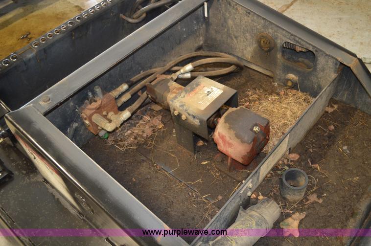 image for item G3594 Bobcat Brushcat 60 rotary mower skid steer attachment