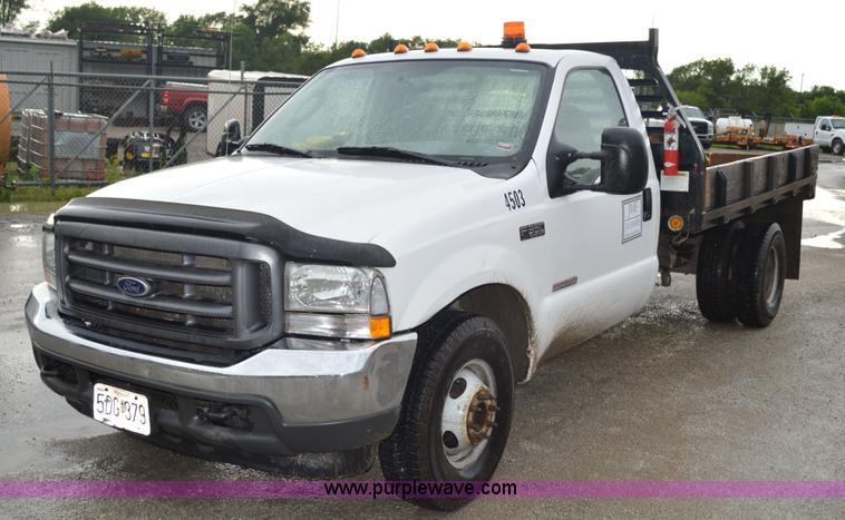 image for item G3601 2004 Ford F350 Super Duty XL flatbed pickup truck