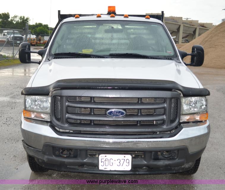image for item G3601 2004 Ford F350 Super Duty XL flatbed pickup truck