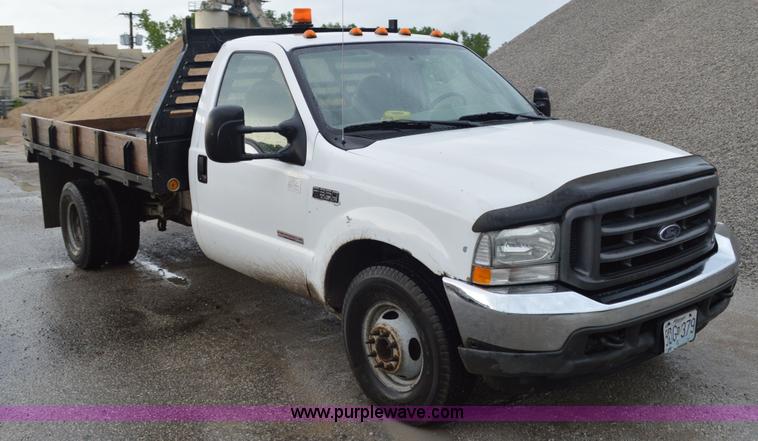 image for item G3601 2004 Ford F350 Super Duty XL flatbed pickup truck