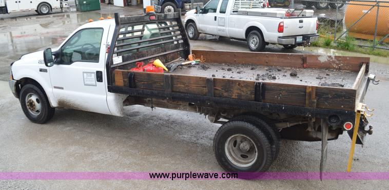 image for item G3601 2004 Ford F350 Super Duty XL flatbed pickup truck