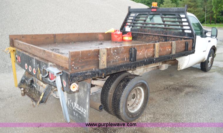 image for item G3601 2004 Ford F350 Super Duty XL flatbed pickup truck