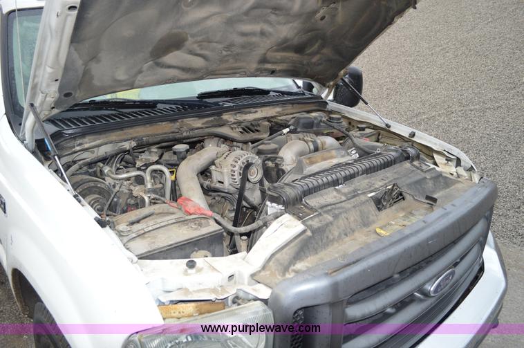 image for item G3601 2004 Ford F350 Super Duty XL flatbed pickup truck