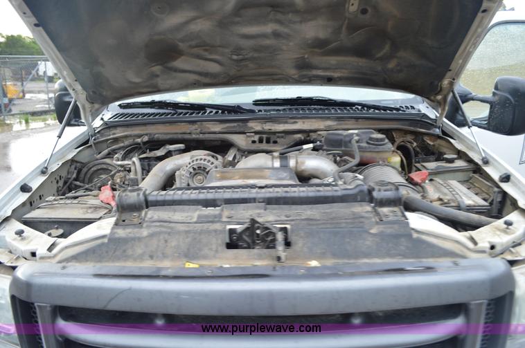 image for item G3601 2004 Ford F350 Super Duty XL flatbed pickup truck