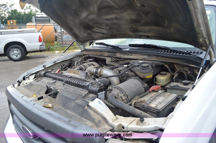 image for item G3601 2004 Ford F350 Super Duty XL flatbed pickup truck