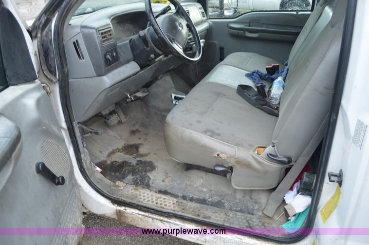 image for item G3601 2004 Ford F350 Super Duty XL flatbed pickup truck