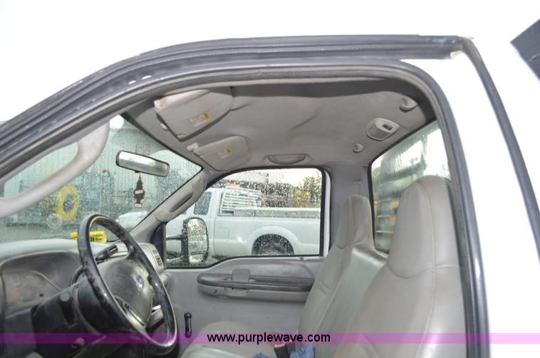 image for item G3601 2004 Ford F350 Super Duty XL flatbed pickup truck