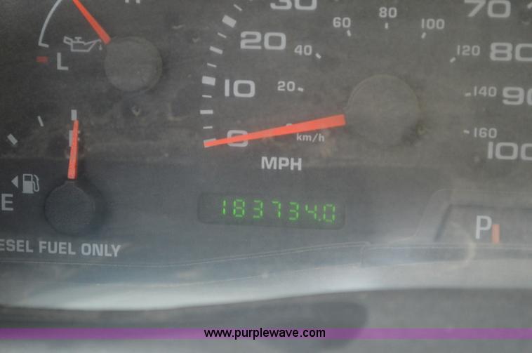 image for item G3601 2004 Ford F350 Super Duty XL flatbed pickup truck