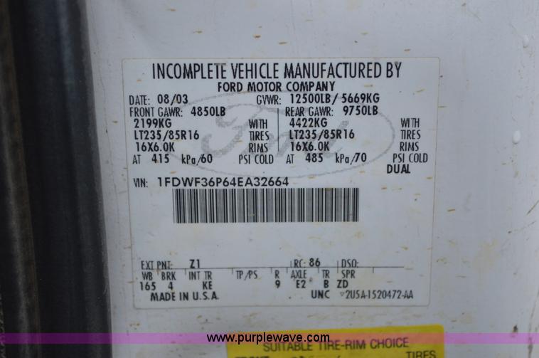 image for item G3601 2004 Ford F350 Super Duty XL flatbed pickup truck