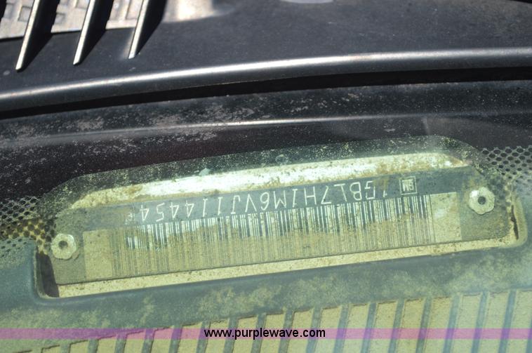 image for item G3608 1997 Chevrolet C7500 flatbed truck