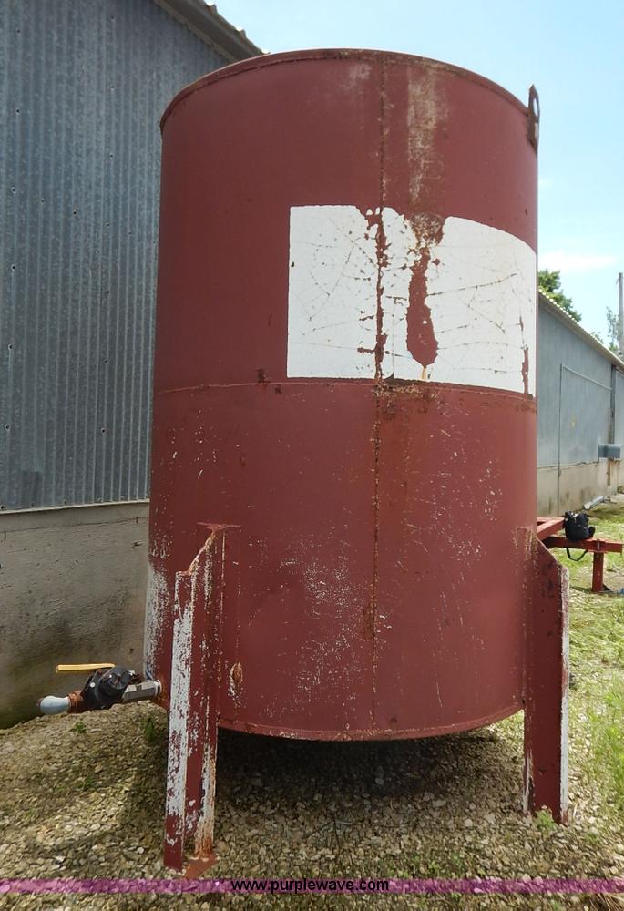 image for item J3890 Approximately 1,100 gallon liquid herbicide tank with stand