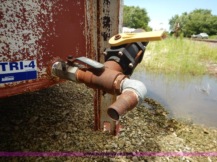 image for item J3890 Approximately 1,100 gallon liquid herbicide tank with stand