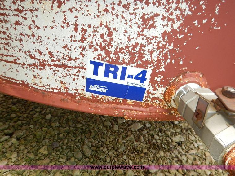 image for item J3890 Approximately 1,100 gallon liquid herbicide tank with stand