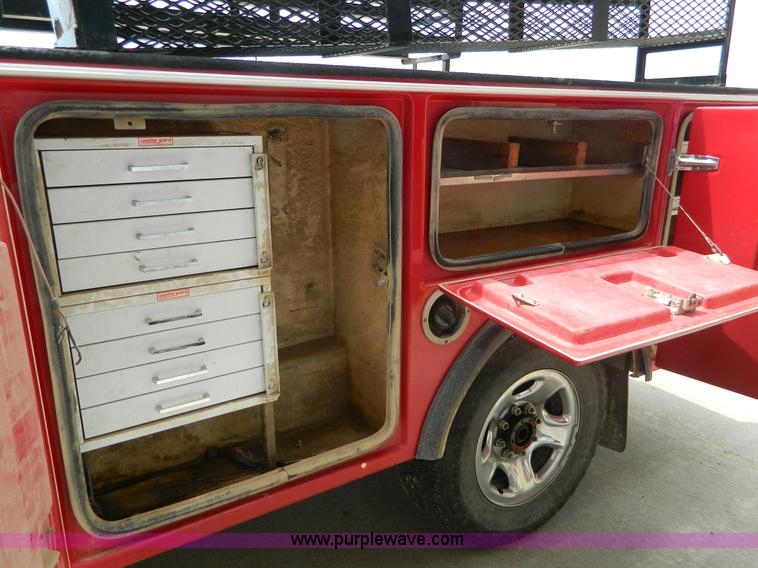 image for item K8095 2009 Dodge Ram 2500 Quad Cab utility truck