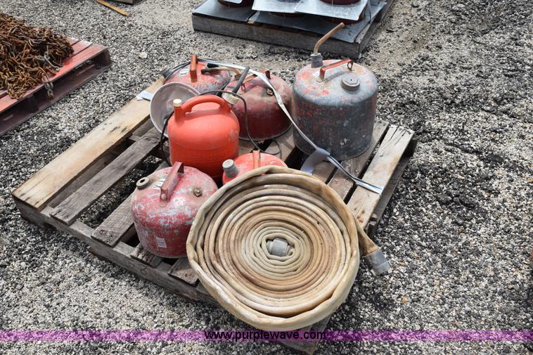 image for item BG9986 Assorted gas cans and fire hose