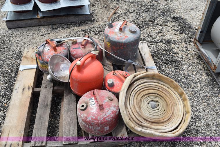 image for item BG9986 Assorted gas cans and fire hose