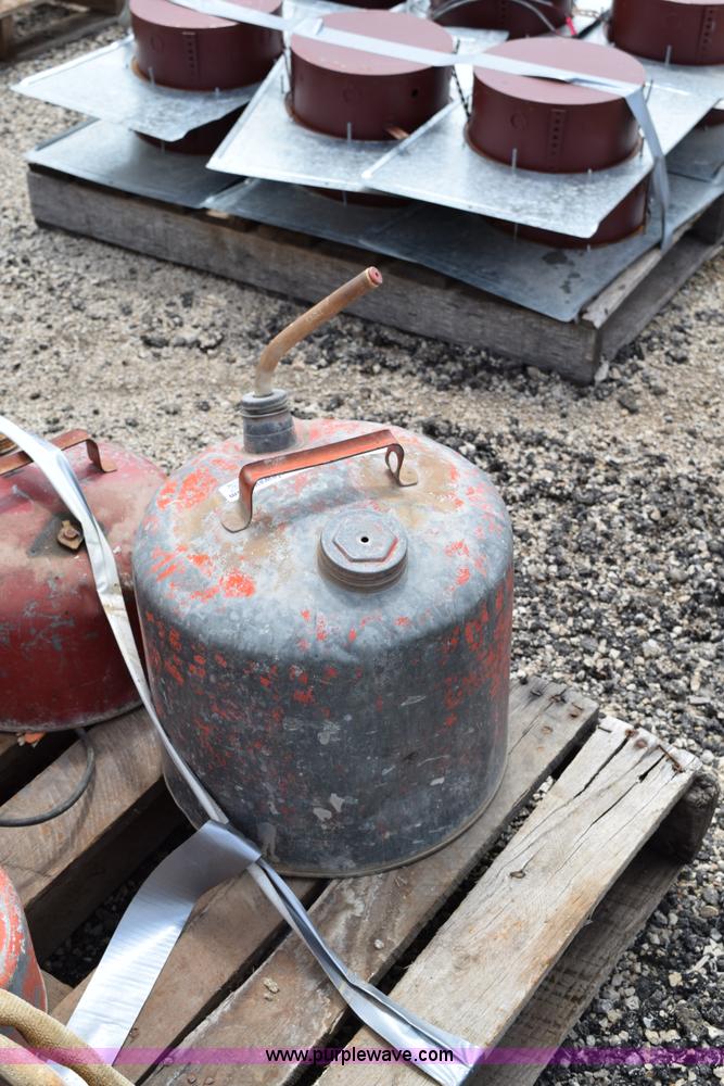image for item BG9986 Assorted gas cans and fire hose