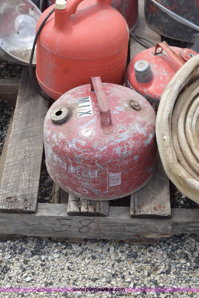 image for item BG9986 Assorted gas cans and fire hose