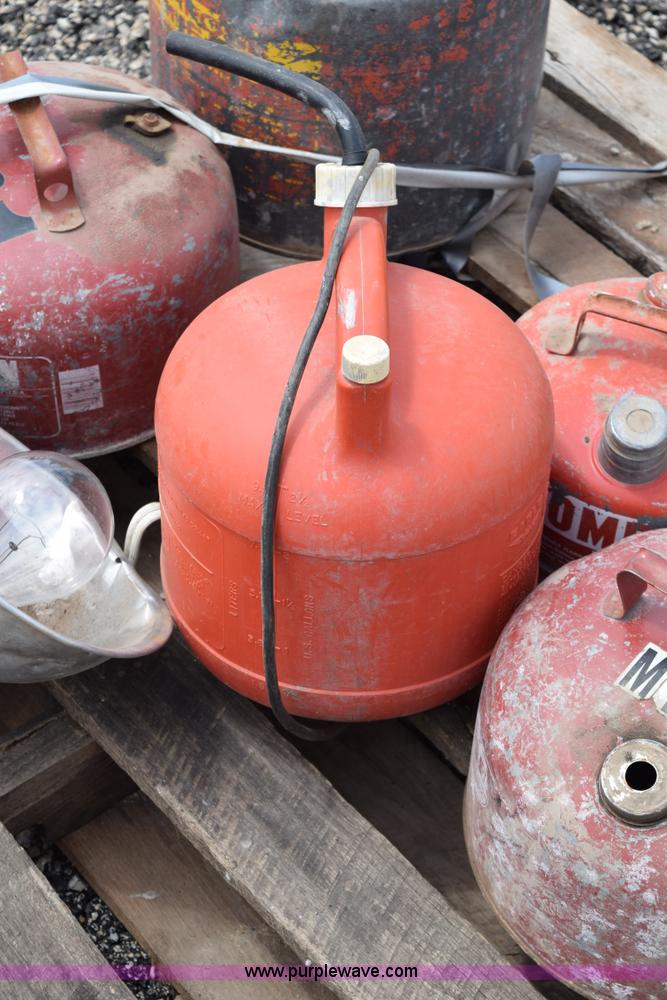 image for item BG9986 Assorted gas cans and fire hose