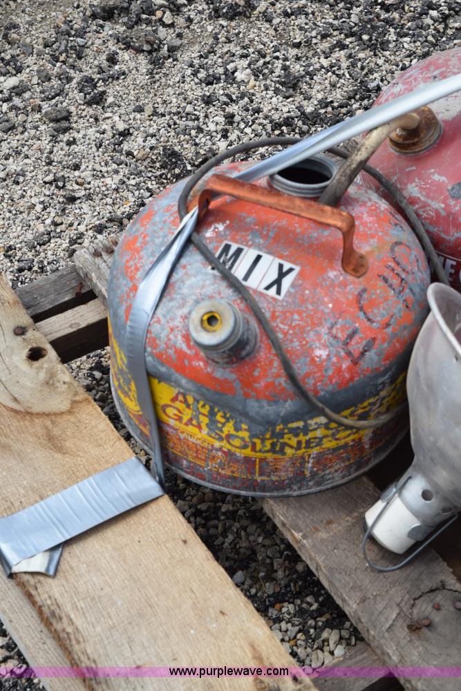 image for item BG9986 Assorted gas cans and fire hose